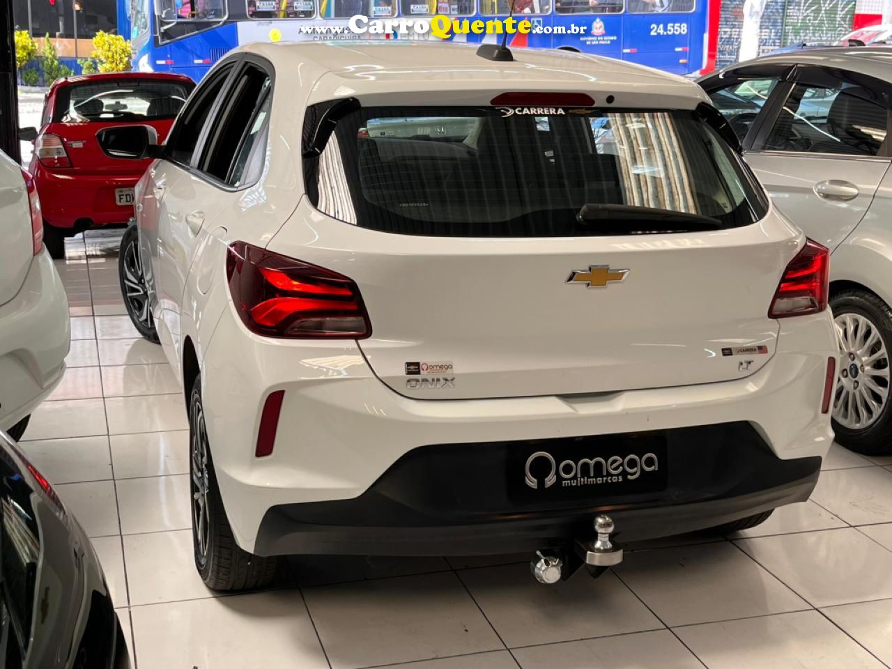 CHEVROLET   ONIX HATCH LT 1.0 12V FLEX 5P MEC.   BRANCO 2024 1.0 FLEX - Loja
