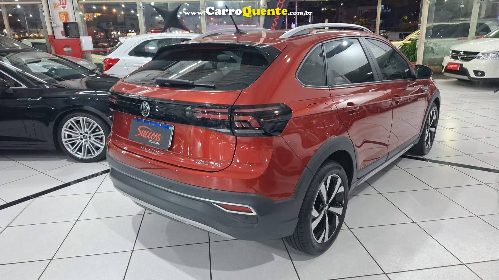 VOLKSWAGEN NIVUS 1.0 200 TSI TOTAL HIGHLINE 2022 - Loja