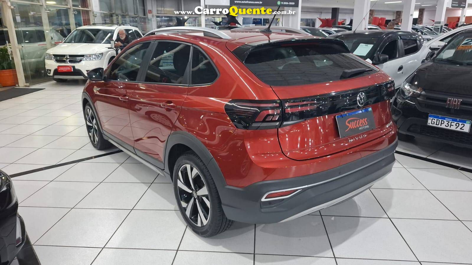 VOLKSWAGEN NIVUS 1.0 200 TSI TOTAL HIGHLINE 2022 - Loja