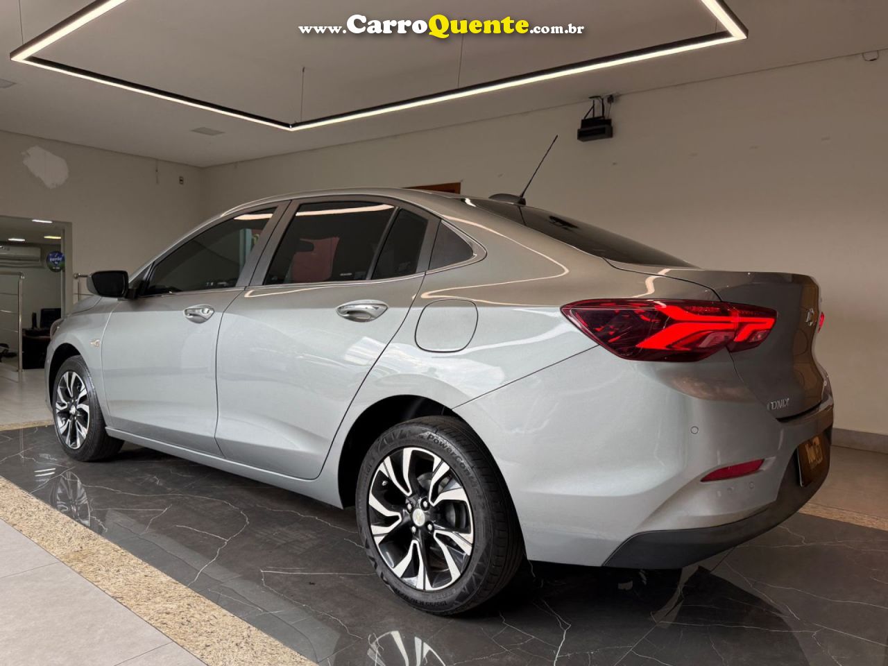 CHEVROLET   ONIX SED. PLUS PREM. 1.0 12V TB FLEX AUT   PRATA 2025 1.0 FLEX - Loja