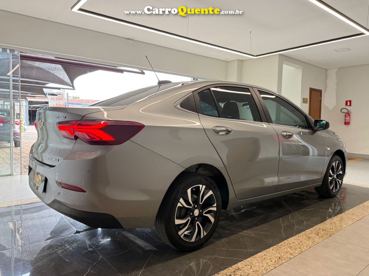 CHEVROLET   ONIX SED. PLUS PREM. 1.0 12V TB FLEX AUT   PRATA 2025 1.0 FLEX - Loja