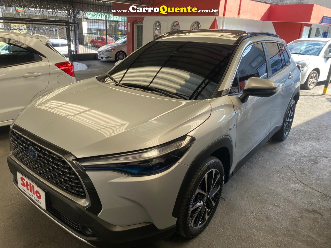 TOYOTA   COROLLA CROSS XRX 1.8 16V AUT.(HYBRID)   PRATA 2023 1.8 GASOLINA E ELÉTRICO - Loja