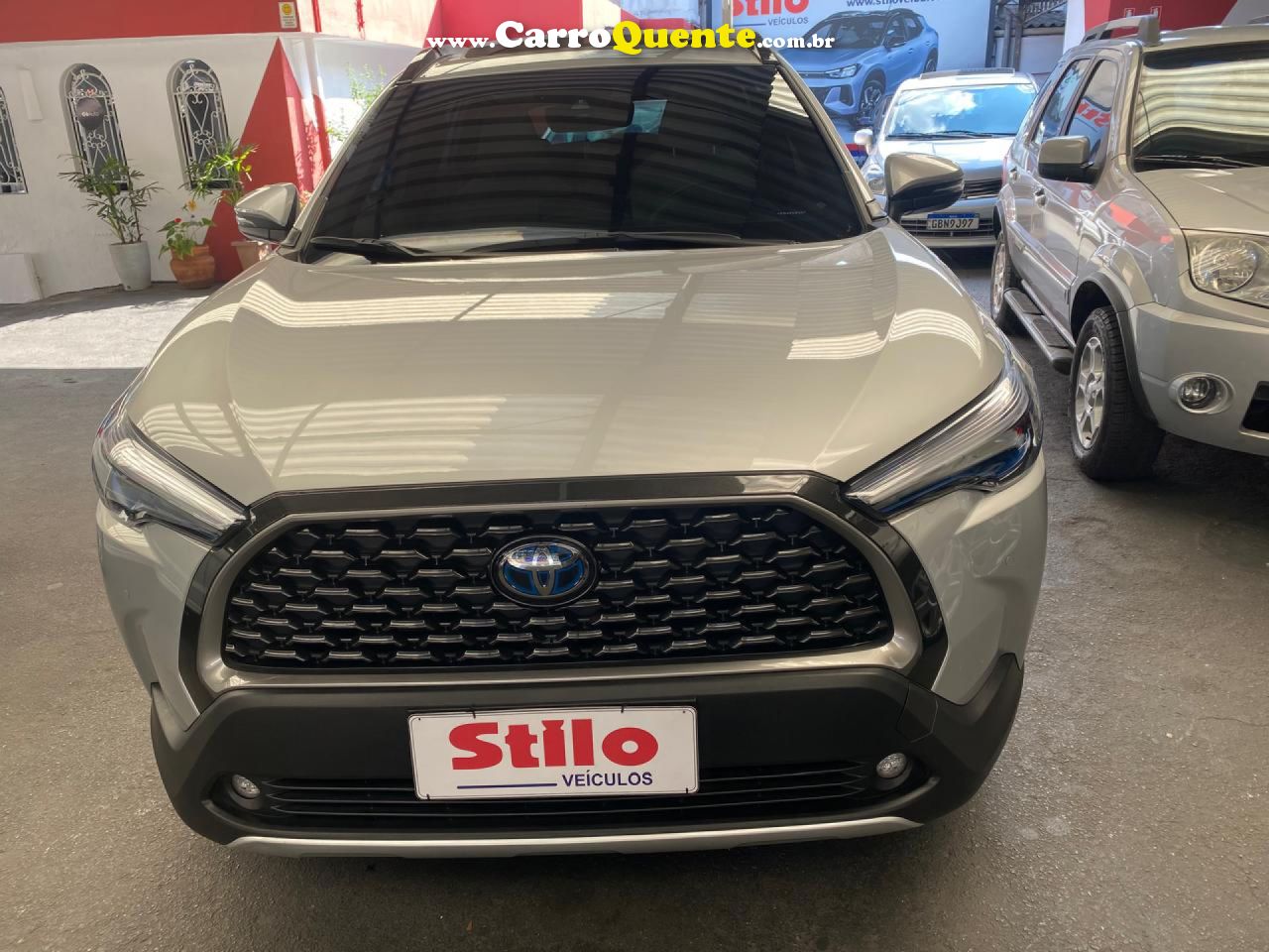 TOYOTA   COROLLA CROSS XRX 1.8 16V AUT.(HYBRID)   PRATA 2023 1.8 GASOLINA E ELÉTRICO - Loja