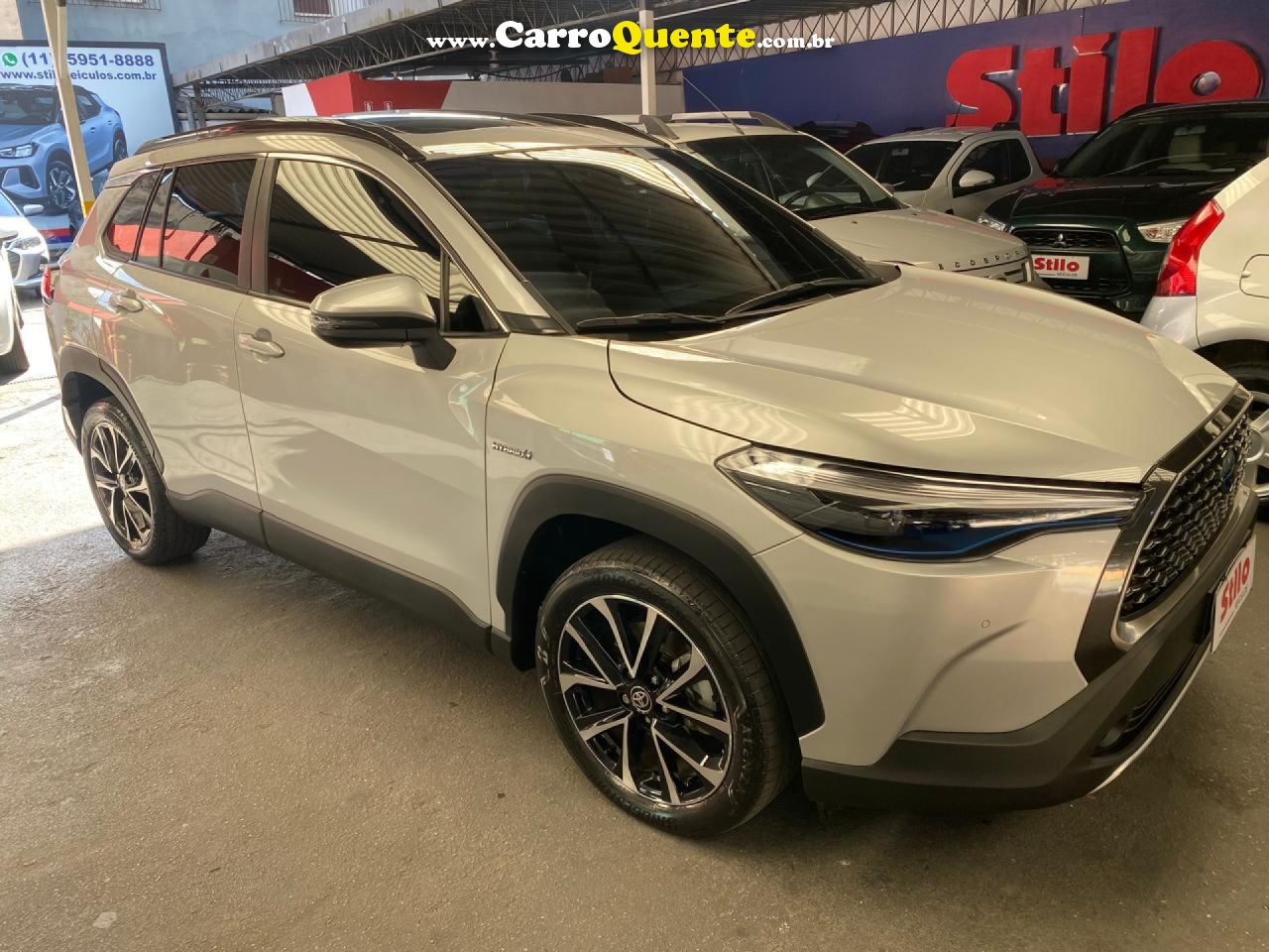 TOYOTA   COROLLA CROSS XRX 1.8 16V AUT.(HYBRID)   PRATA 2023 1.8 GASOLINA E ELÉTRICO - Loja