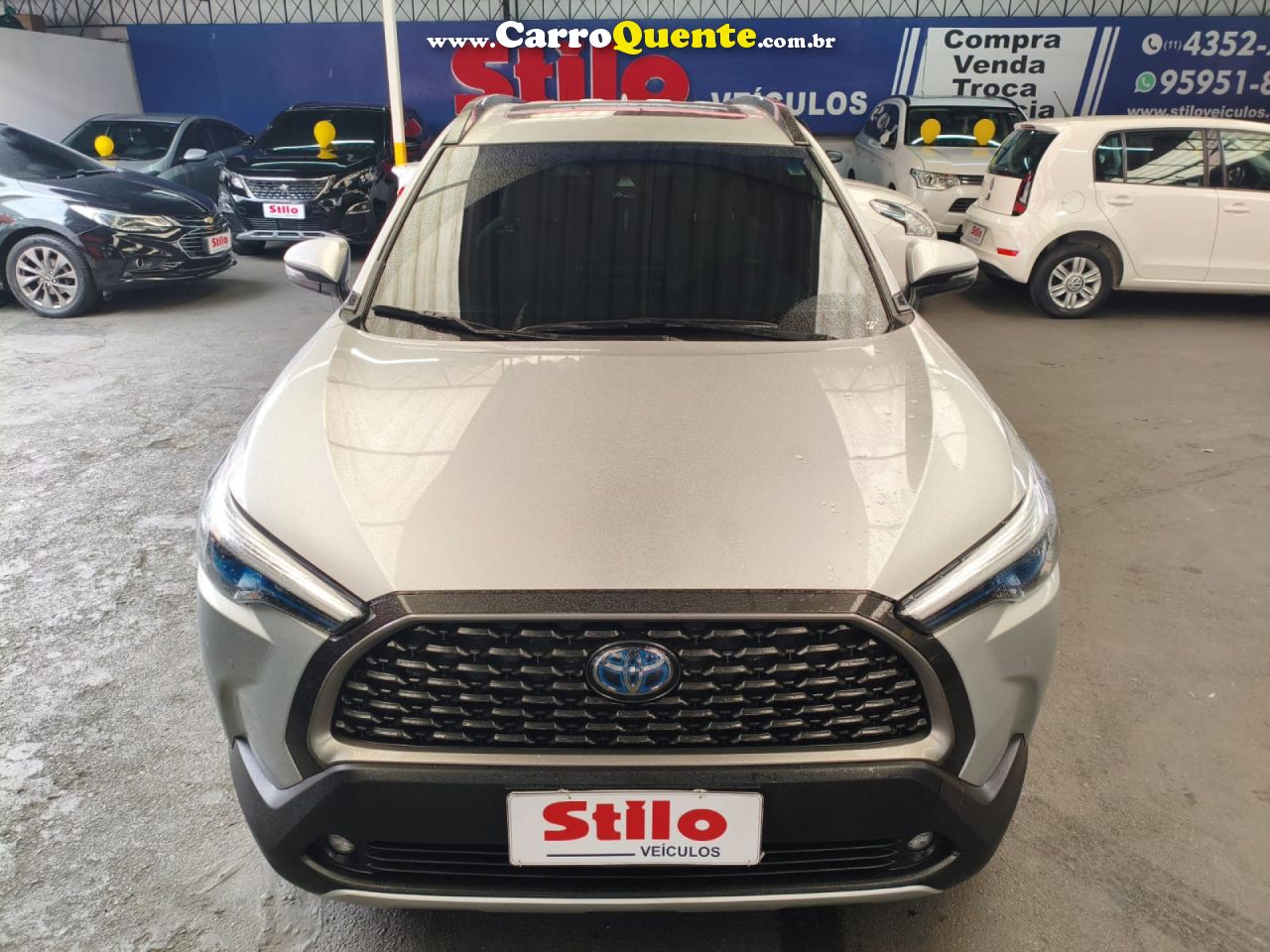 TOYOTA   COROLLA CROSS XRX 1.8 16V AUT.(HYBRID)   PRATA 2023 1.8 GASOLINA E ELÉTRICO - Loja