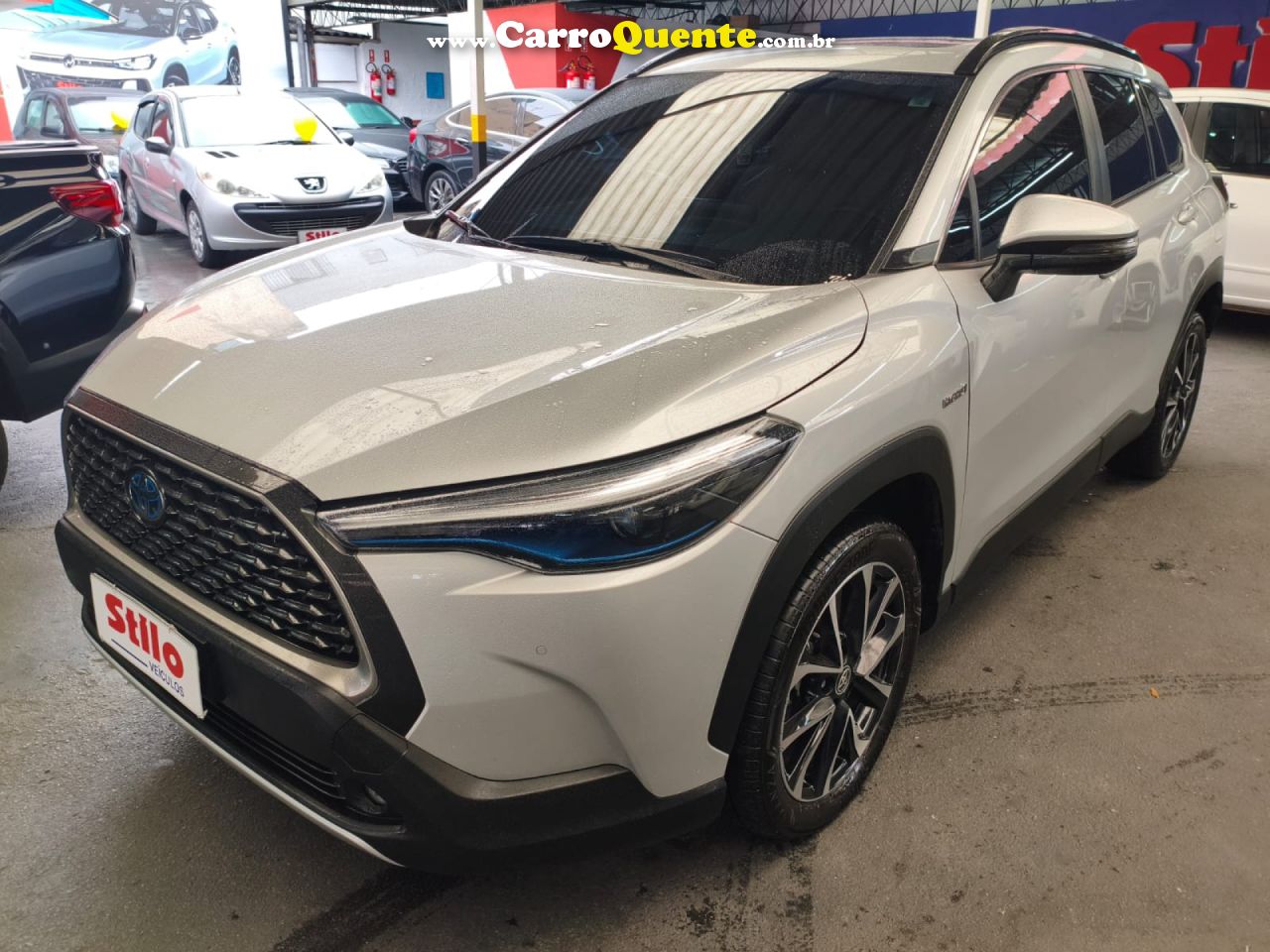 TOYOTA   COROLLA CROSS XRX 1.8 16V AUT.(HYBRID)   PRATA 2023 1.8 GASOLINA E ELÉTRICO - Loja