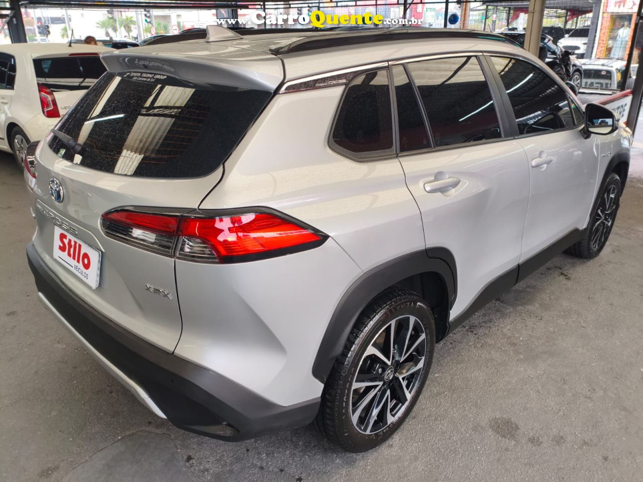 TOYOTA   COROLLA CROSS XRX 1.8 16V AUT.(HYBRID)   PRATA 2023 1.8 GASOLINA E ELÉTRICO - Loja