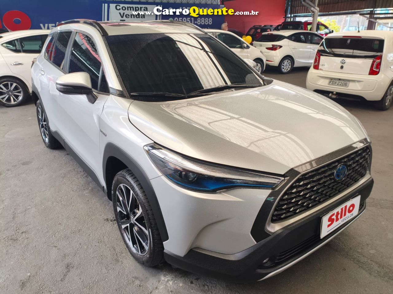 TOYOTA   COROLLA CROSS XRX 1.8 16V AUT.(HYBRID)   PRATA 2023 1.8 GASOLINA E ELÉTRICO - Loja