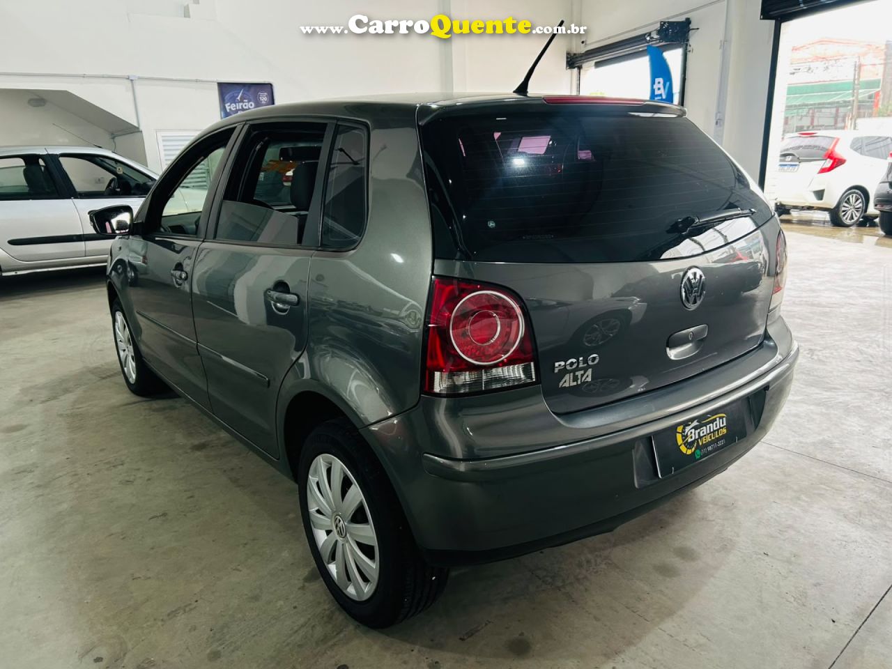 VOLKSWAGEN   POLO 1.6 MIS.OURO 1.6 MI TOT.FLEX 8V 5P   CINZA 2011 1.6 GASOLINA - Loja