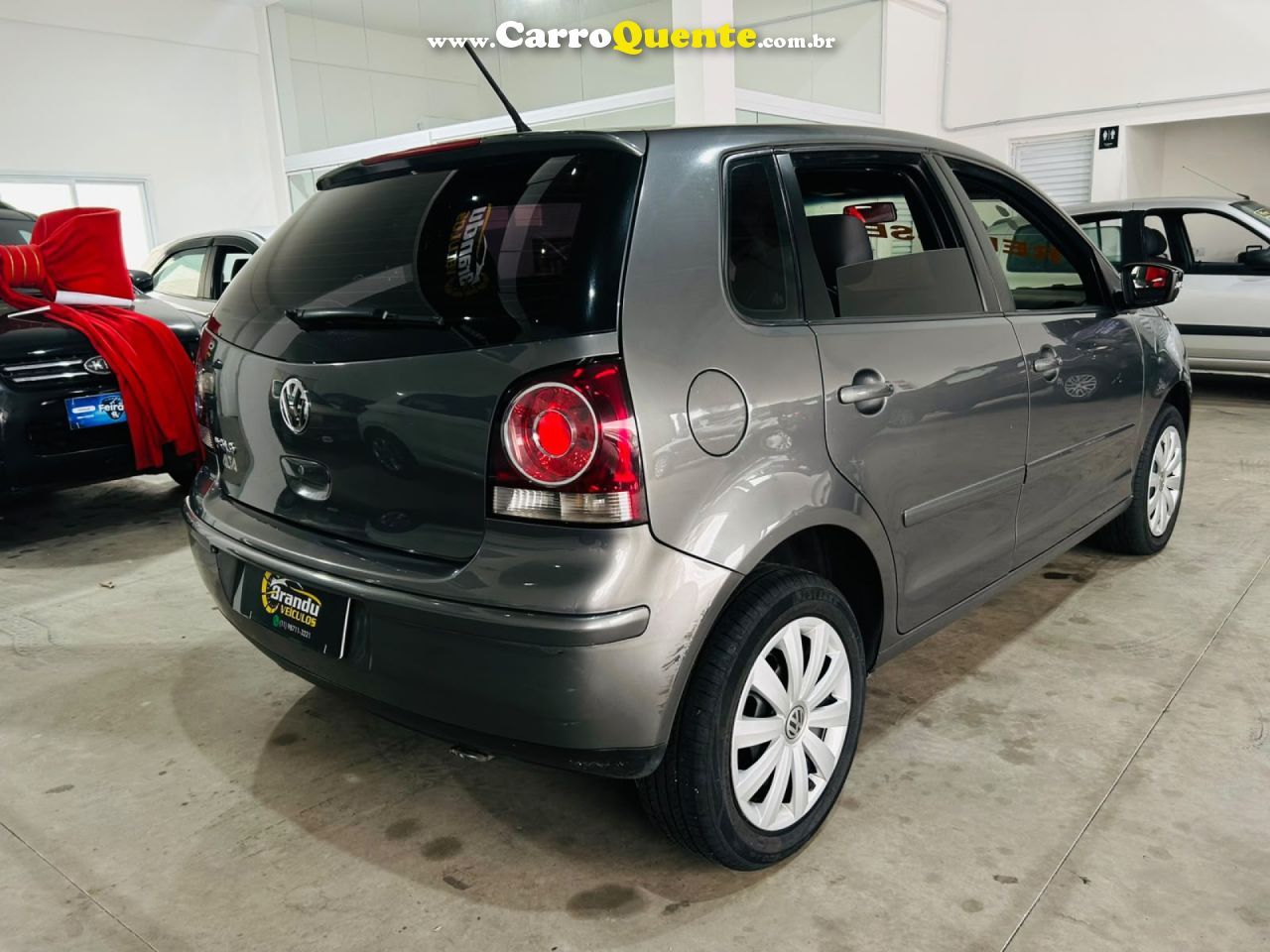 VOLKSWAGEN   POLO 1.6 MIS.OURO 1.6 MI TOT.FLEX 8V 5P   CINZA 2011 1.6 GASOLINA - Loja