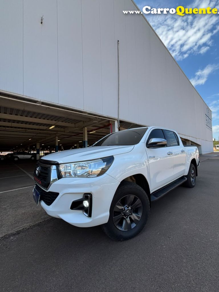 TOYOTA   HILUX CD SRV 4X4 2.8 TDI DIESEL AUT.   BRANCO 2017 2.8 DIESEL - Loja