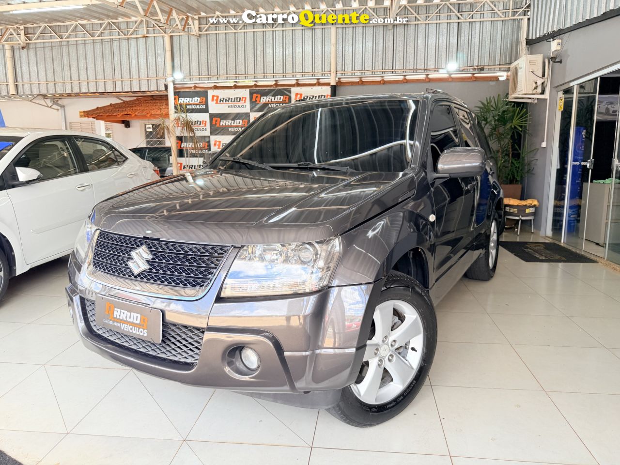 SUZUKI   GRAND VITARA 2.0 16V 4X24X4 5P AUT.   CINZA 2012 2.0 GASOLINA - Loja