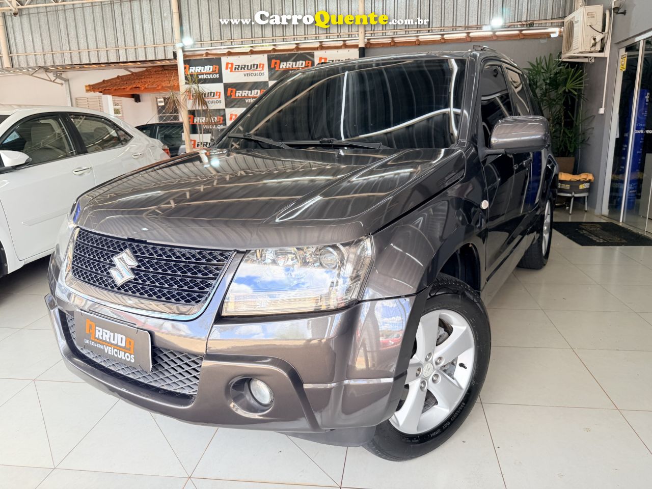 SUZUKI   GRAND VITARA 2.0 16V 4X24X4 5P AUT.   CINZA 2012 2.0 GASOLINA - Loja