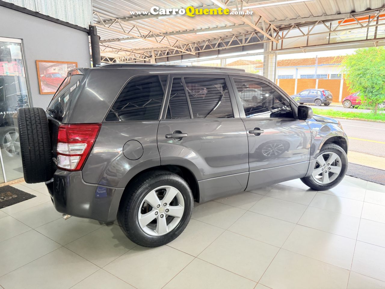 SUZUKI   GRAND VITARA 2.0 16V 4X24X4 5P AUT.   CINZA 2012 2.0 GASOLINA - Loja