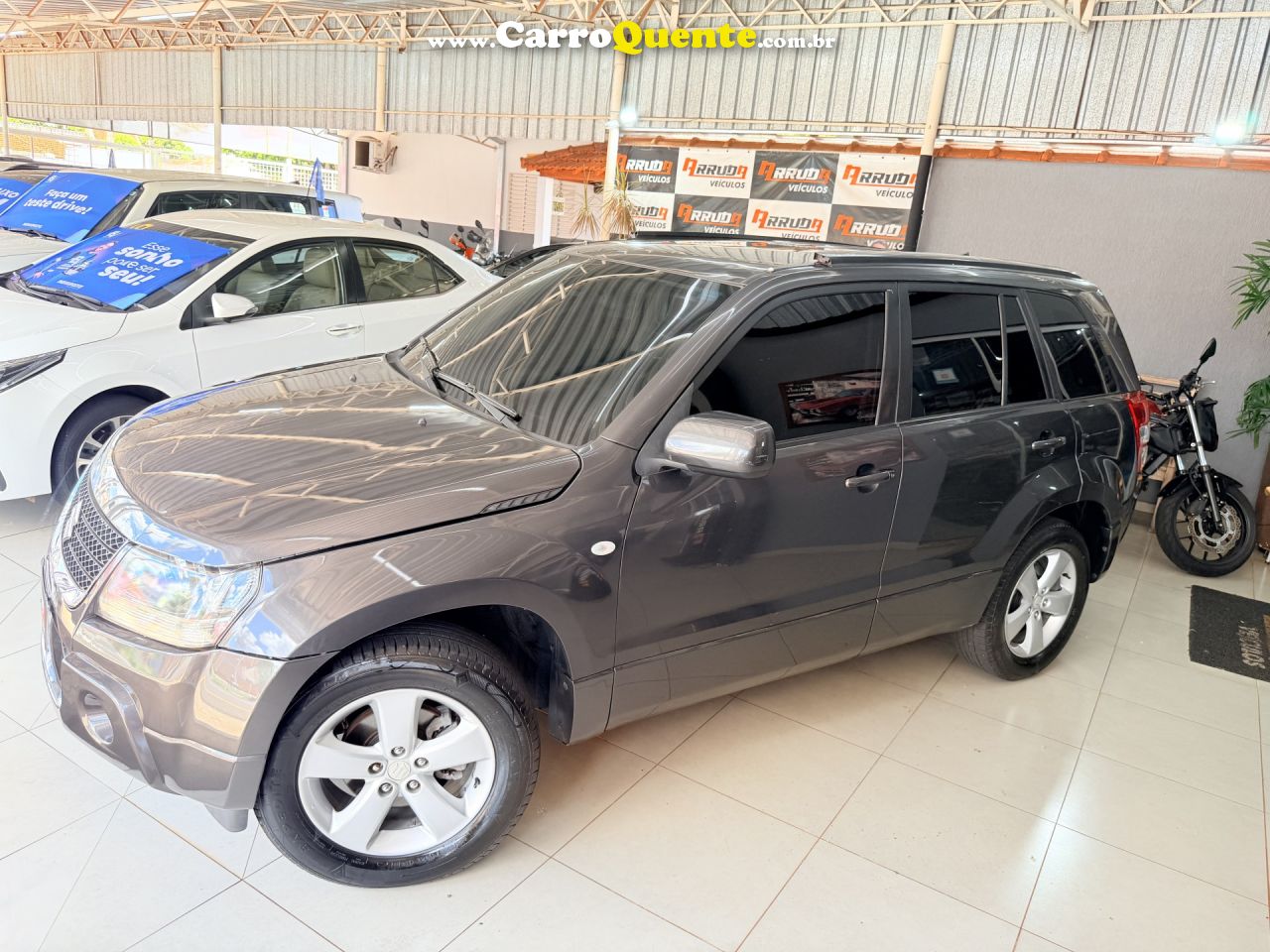 SUZUKI   GRAND VITARA 2.0 16V 4X24X4 5P AUT.   CINZA 2012 2.0 GASOLINA - Loja
