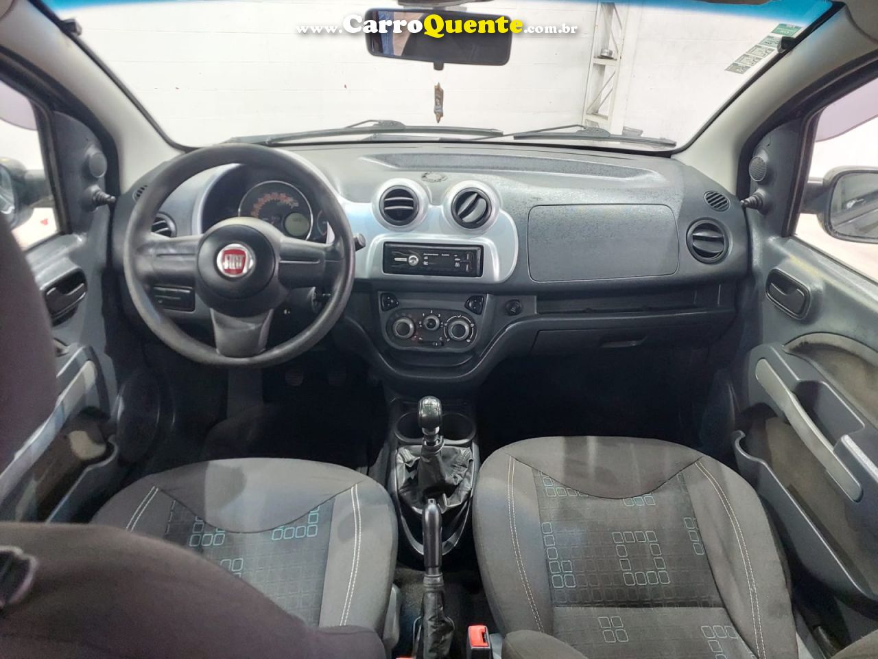 FIAT   UNO ECONOMY CELEB. 1.4 EVO F. FLEX 8V 4P   CINZA 2013 1.4 FLEX - Loja