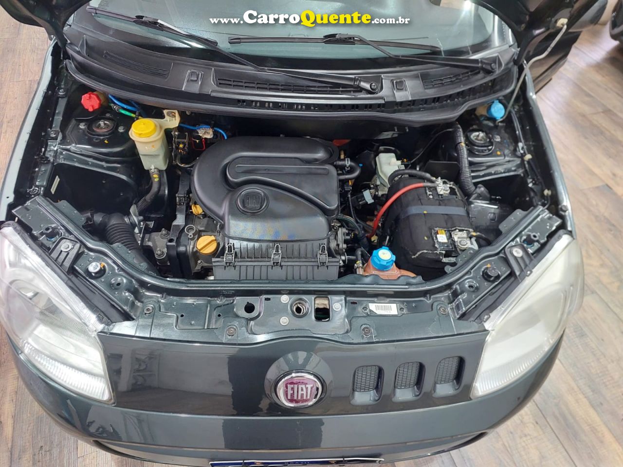 FIAT   UNO ECONOMY CELEB. 1.4 EVO F. FLEX 8V 4P   CINZA 2013 1.4 FLEX - Loja