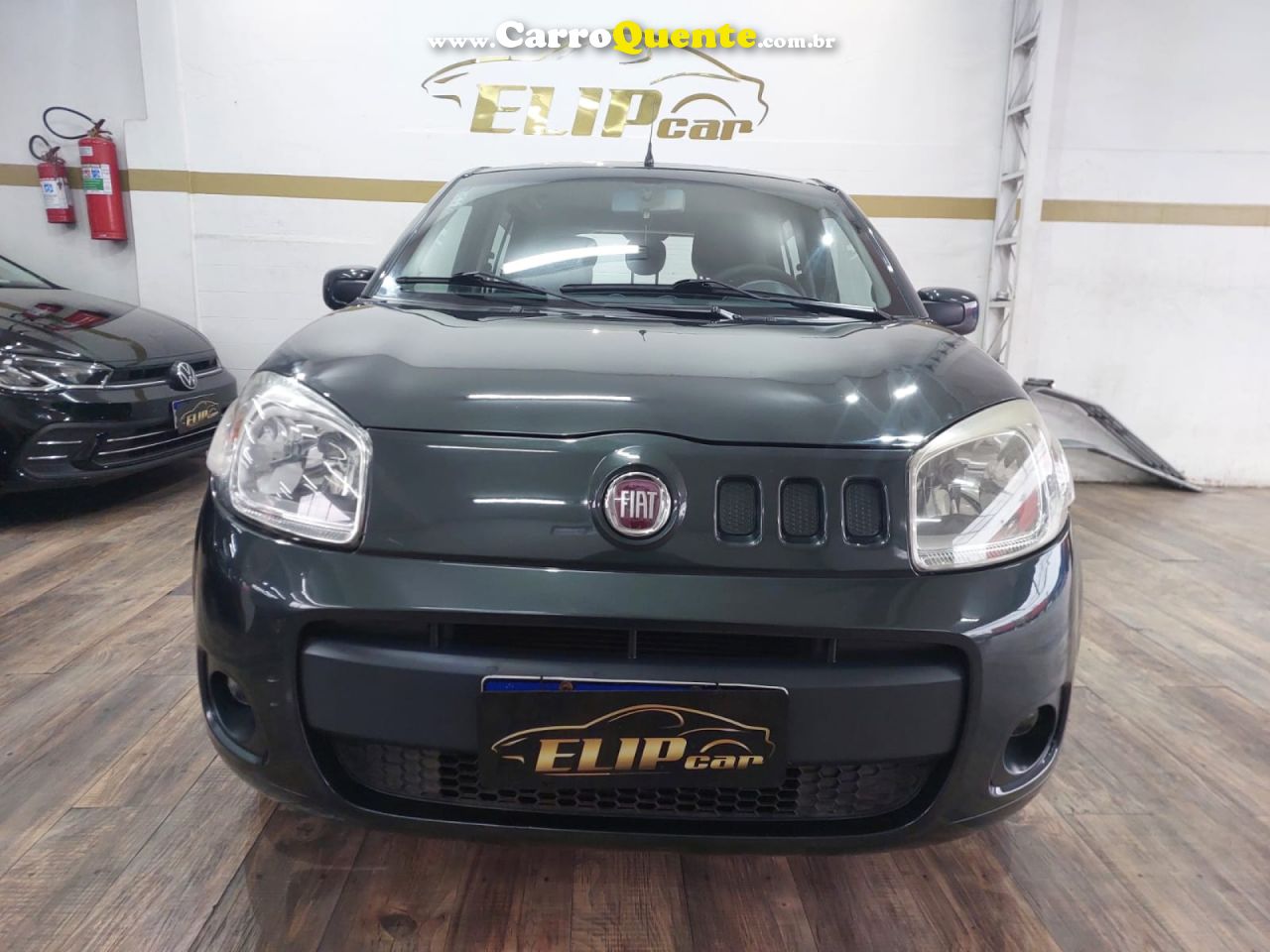 FIAT   UNO ECONOMY CELEB. 1.4 EVO F. FLEX 8V 4P   CINZA 2013 1.4 FLEX - Loja