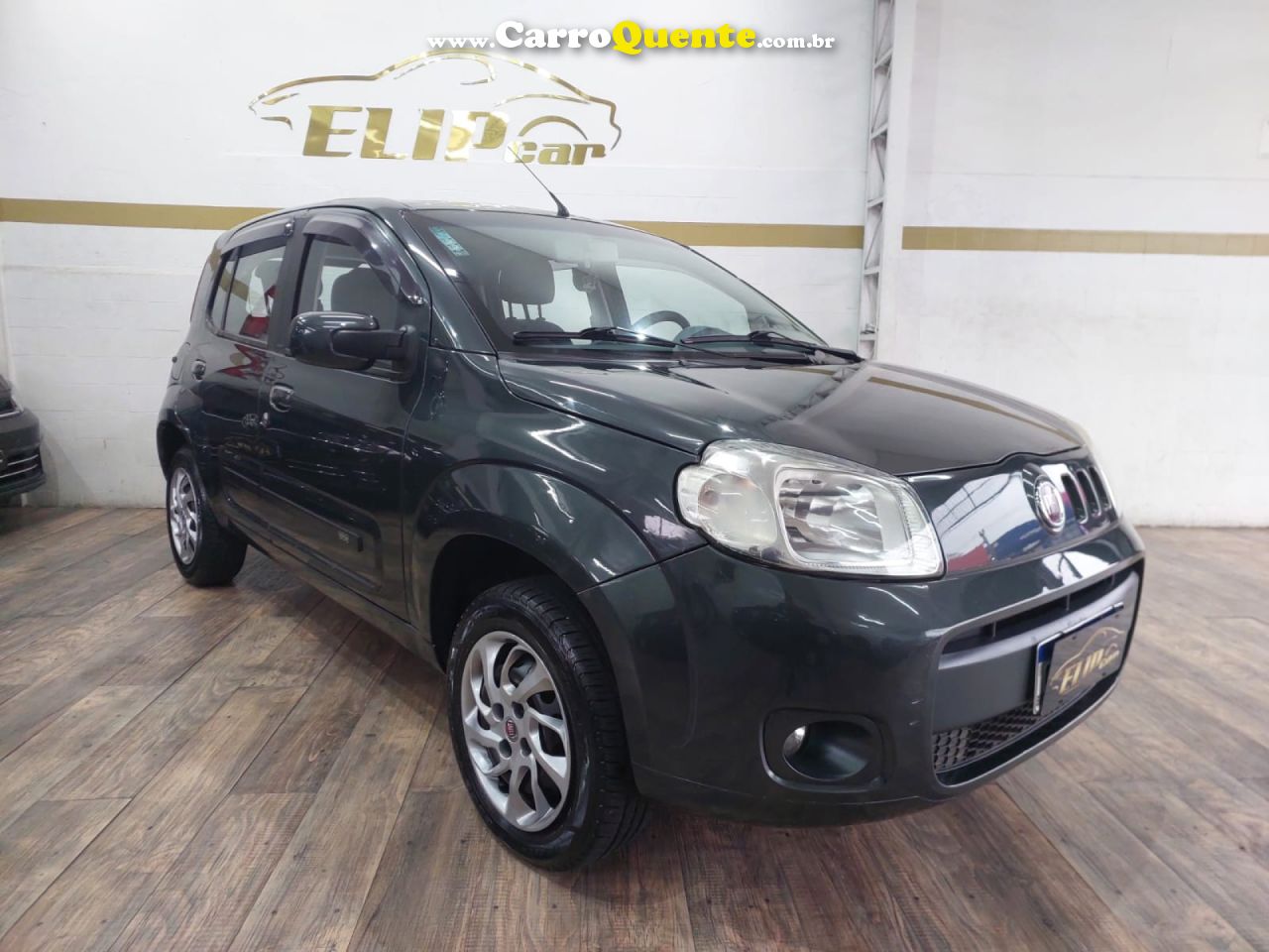 FIAT   UNO ECONOMY CELEB. 1.4 EVO F. FLEX 8V 4P   CINZA 2013 1.4 FLEX - Loja