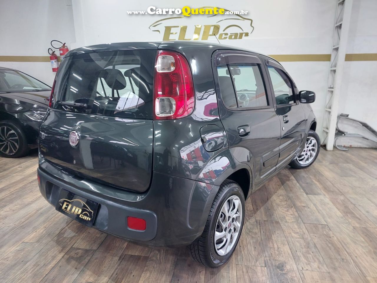 FIAT   UNO ECONOMY CELEB. 1.4 EVO F. FLEX 8V 4P   CINZA 2013 1.4 FLEX - Loja