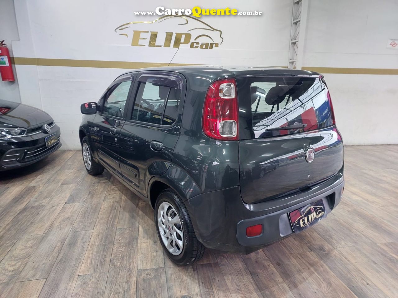 FIAT   UNO ECONOMY CELEB. 1.4 EVO F. FLEX 8V 4P   CINZA 2013 1.4 FLEX - Loja