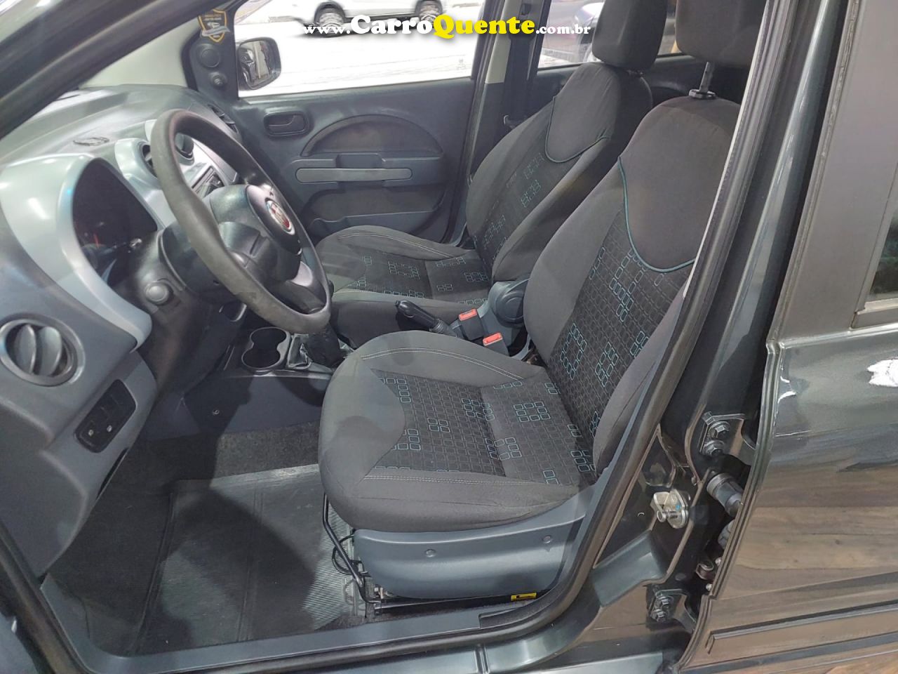 FIAT   UNO ECONOMY CELEB. 1.4 EVO F. FLEX 8V 4P   CINZA 2013 1.4 FLEX - Loja