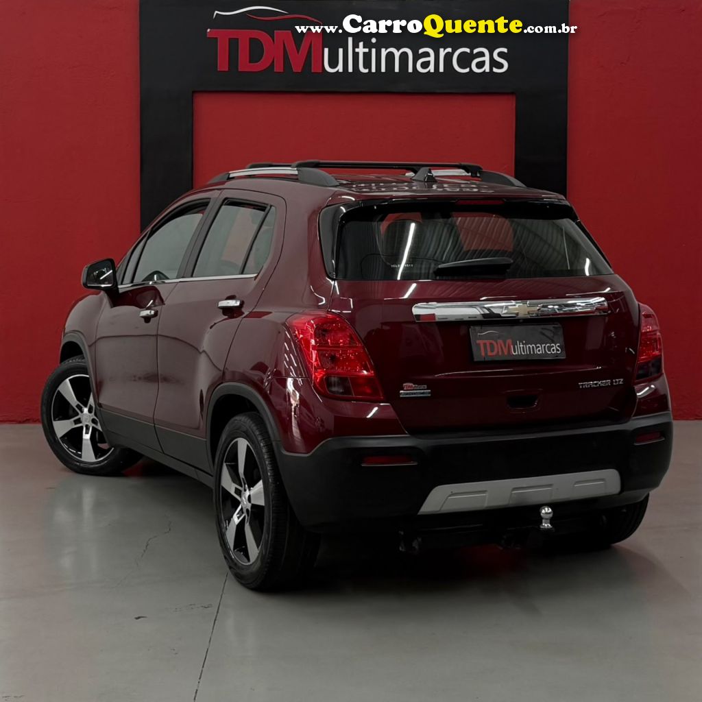 CHEVROLET   TRACKER LTZ 1.8 16V FLEX 4X2 AUT.   VERMELHO 2014 1.8 FLEX - Loja