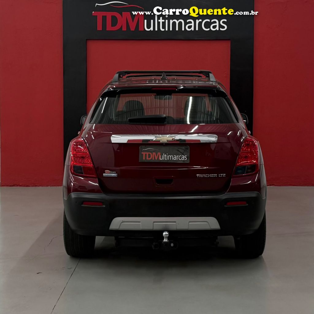 CHEVROLET   TRACKER LTZ 1.8 16V FLEX 4X2 AUT.   VERMELHO 2014 1.8 FLEX - Loja