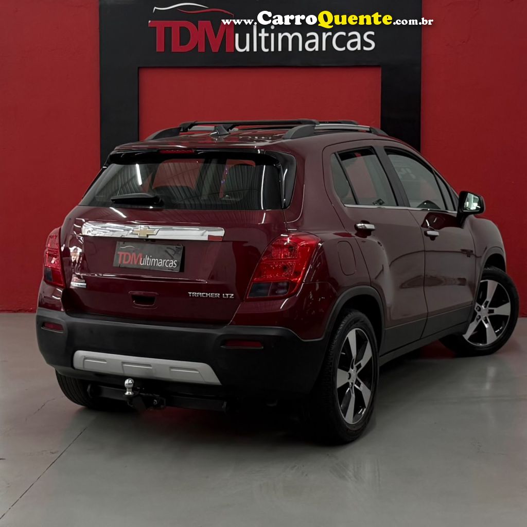 CHEVROLET   TRACKER LTZ 1.8 16V FLEX 4X2 AUT.   VERMELHO 2014 1.8 FLEX - Loja