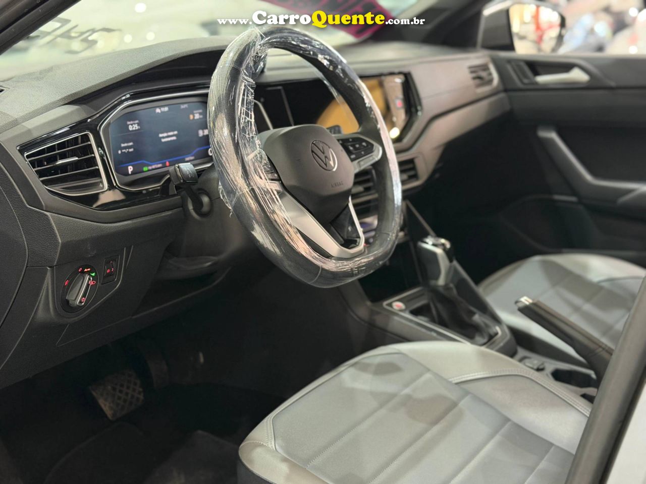 VOLKSWAGEN NIVUS 1.0 200 TSI TOTAL HIGHLINE 2024 - Loja
