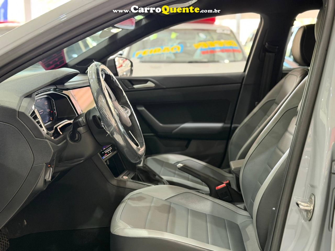 VOLKSWAGEN NIVUS 1.0 200 TSI TOTAL HIGHLINE 2024 - Loja