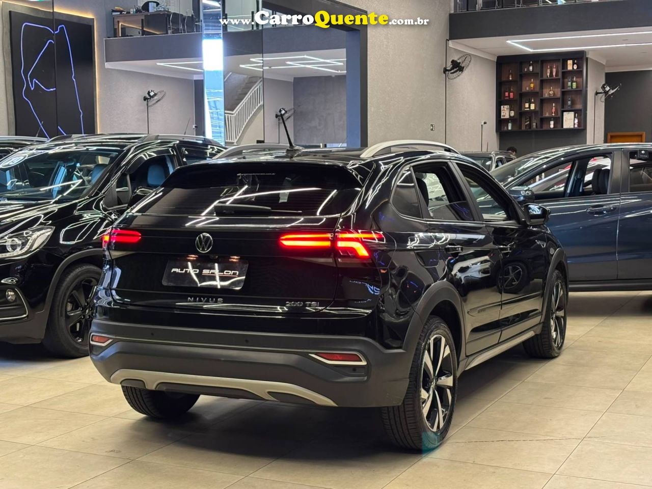 VOLKSWAGEN NIVUS 1.0 200 TSI TOTAL HIGHLINE 2021 - Loja