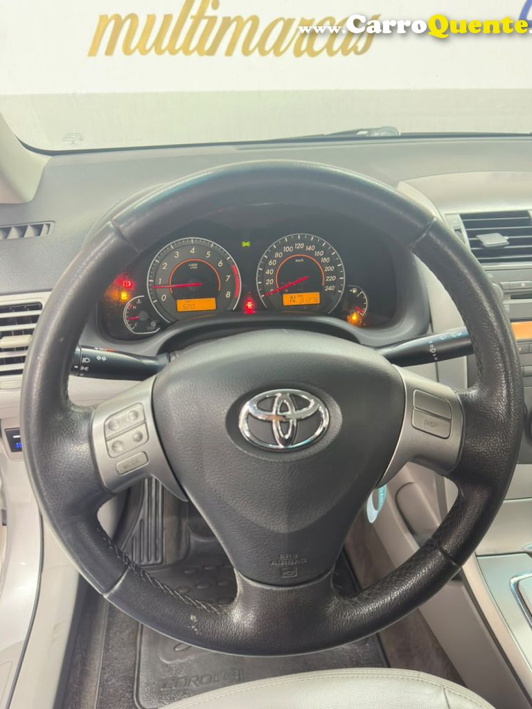 TOYOTA   COROLLA GLI 1.8 FLEX 16V  AUT.   PRATA 2014 1.8 FLEX - Loja