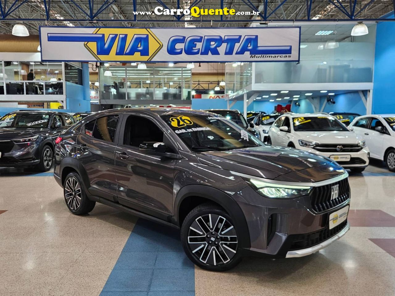 FIAT FASTBACK 1.0 TURBO 200 HYBRID AUDACE 2026 - Loja