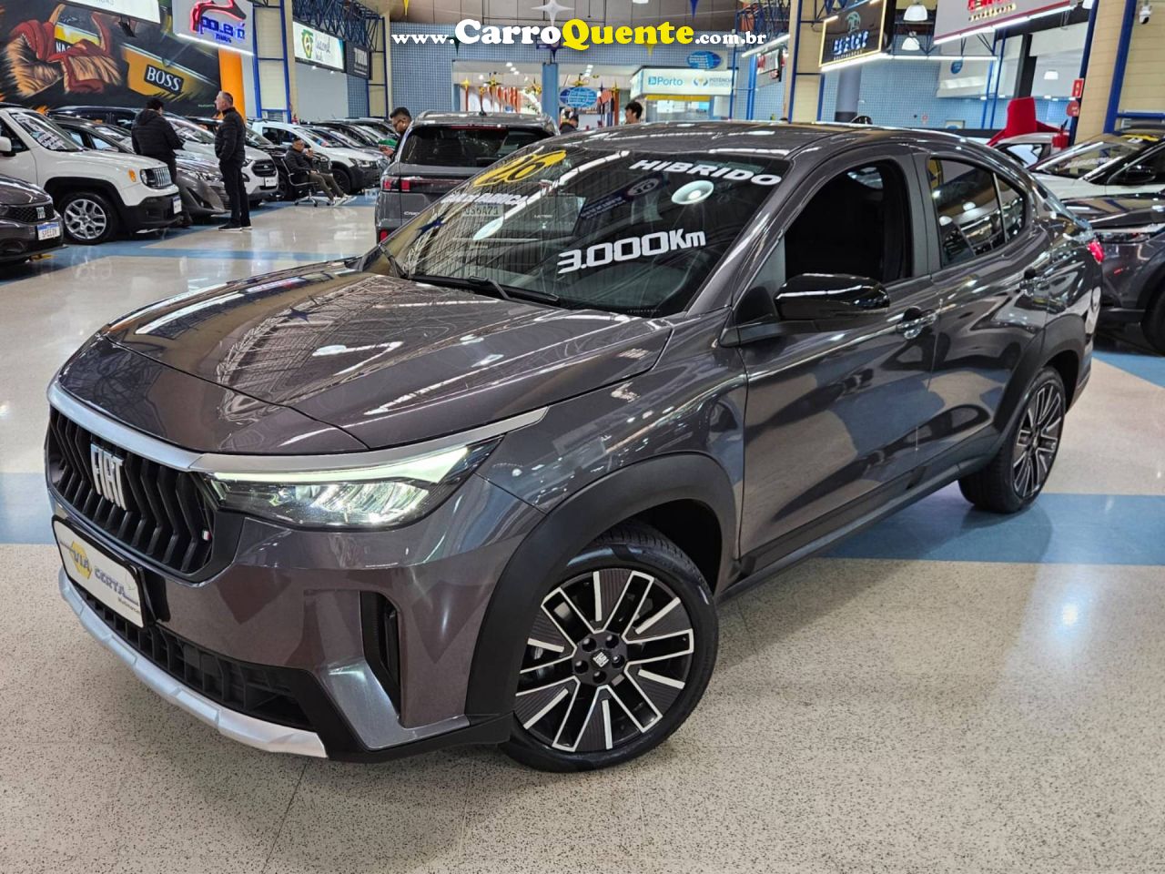 FIAT FASTBACK 1.0 TURBO 200 HYBRID AUDACE 2026 - Loja