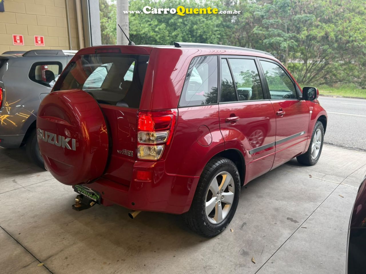 SUZUKI   GRAND VITARA 2.0 16V 4X24X4 5P AUT.   VERMELHO 2010 2.0 GASOLINA - Loja