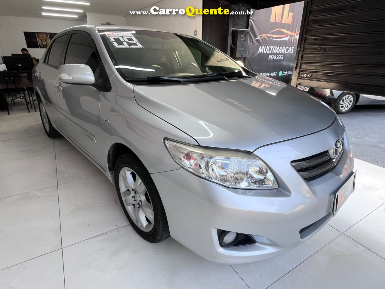 TOYOTA   COROLLA XEI 1.81.8 FLEX 16V AUT.   PRATA 2009 1.8 FLEX - Loja