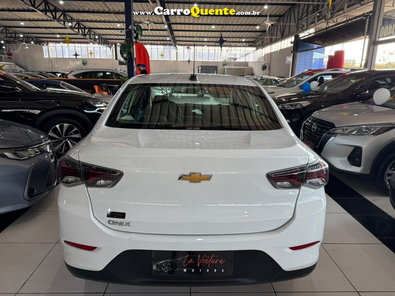 CHEVROLET ONIX 1.0 PLUS 2026 - Loja