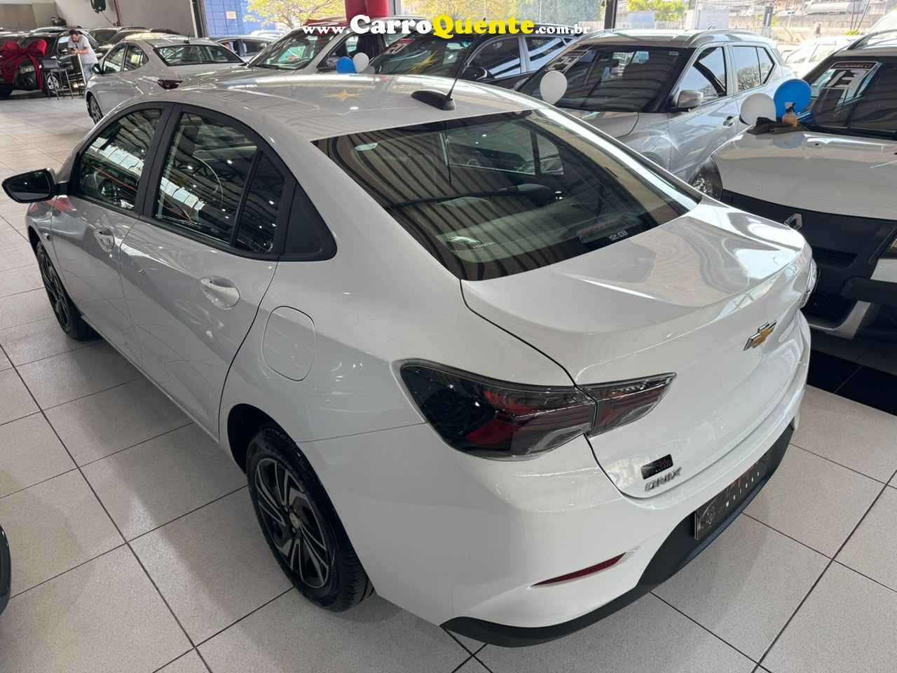 CHEVROLET ONIX 1.0 PLUS 2026 - Loja