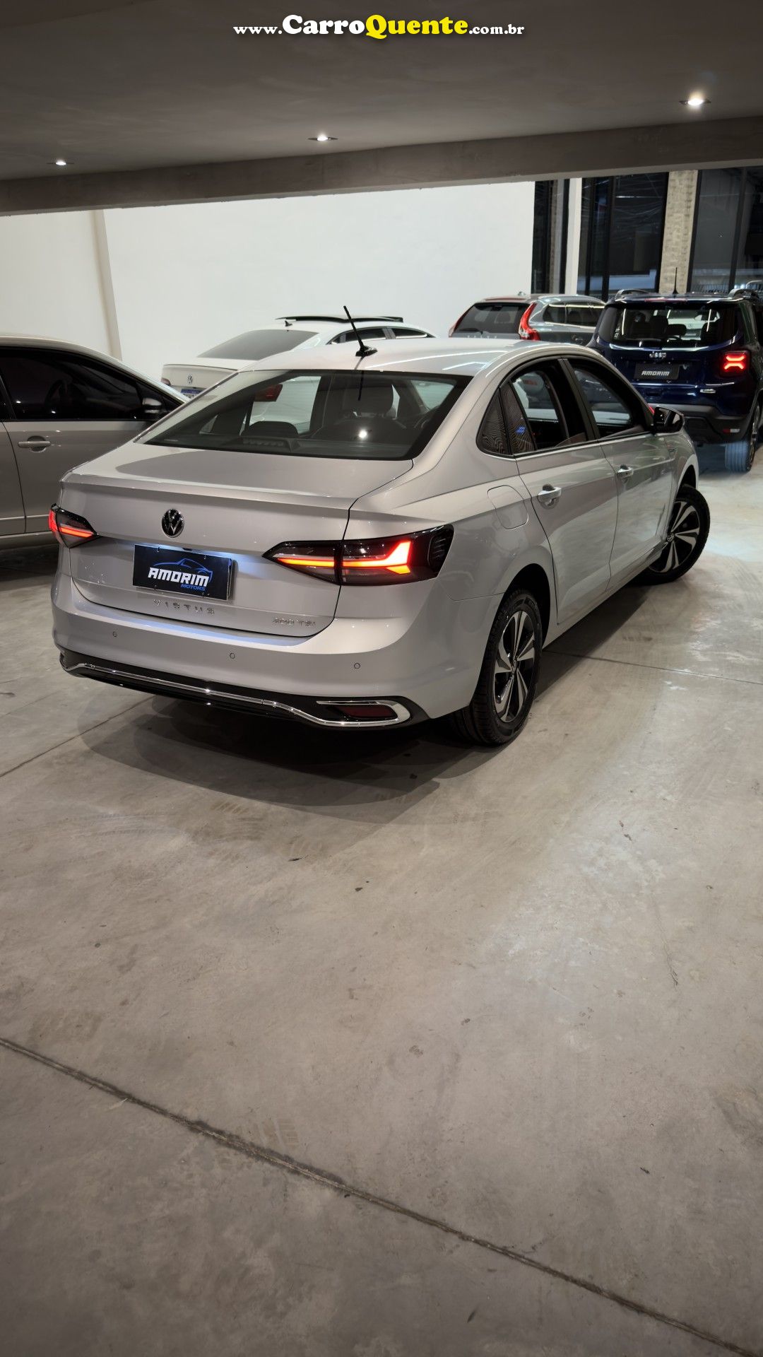 VOLKSWAGEN   VIRTUS COMFORT. 200 TSI 1.0 FLEX 12V AUT   PRATA 2023 1.0 FLEX - Loja