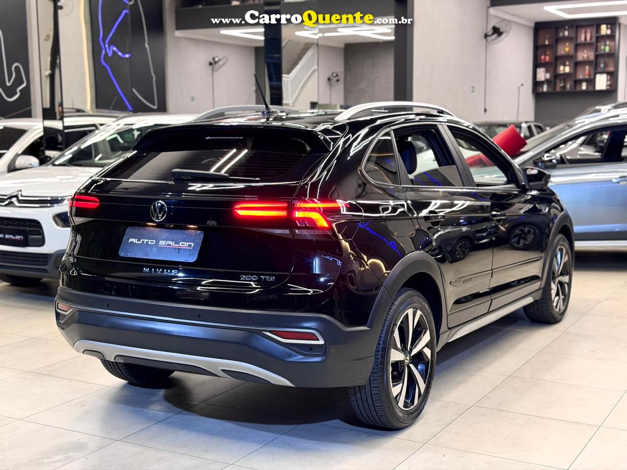 VOLKSWAGEN NIVUS 1.0 200 TSI TOTAL HIGHLINE 2021 - Loja