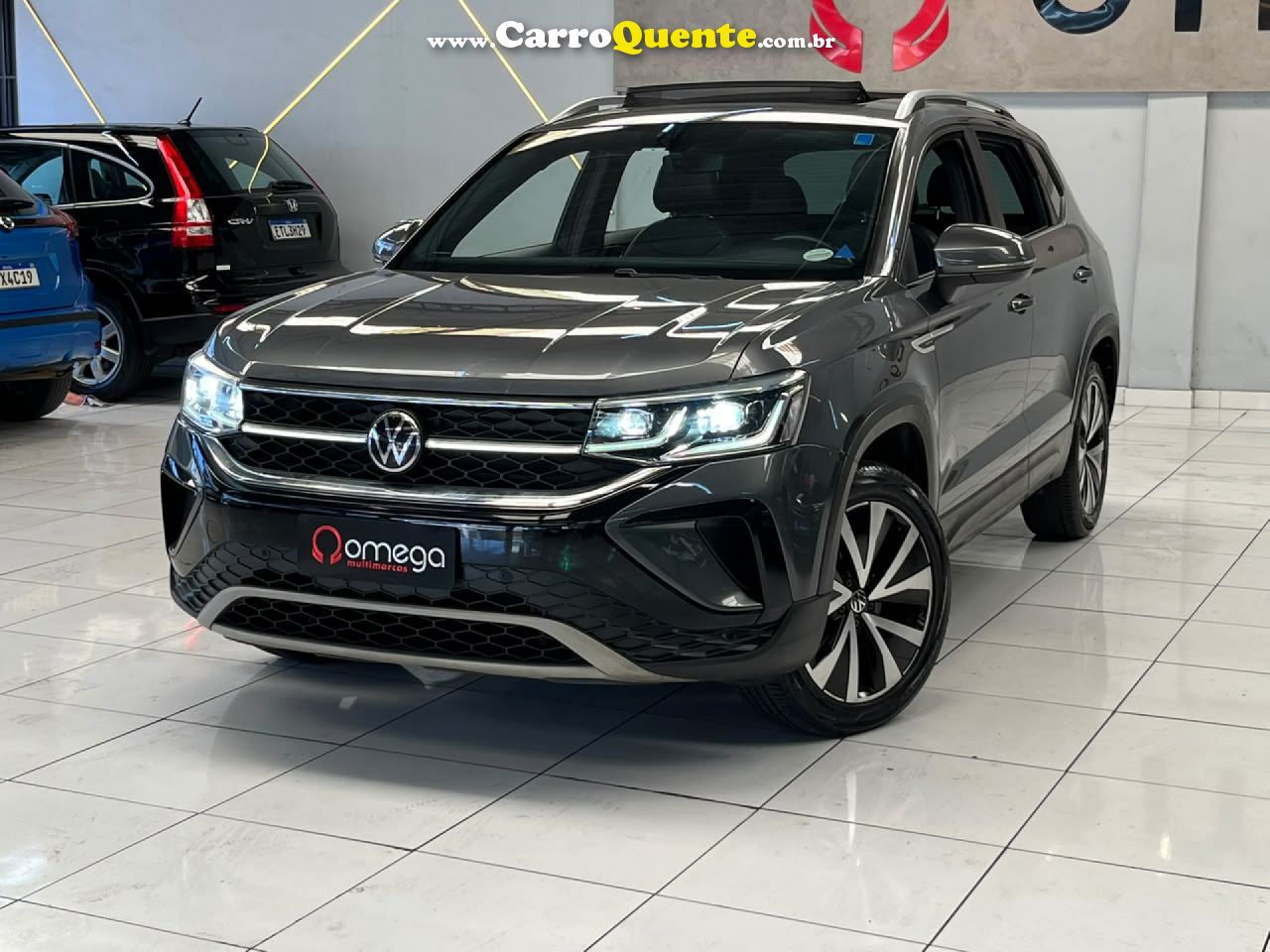 VOLKSWAGEN   TAOS HIGHLINE 1.4 250 TSI FLEX AUT.   CINZA 2022 1.4 FLEX - Loja