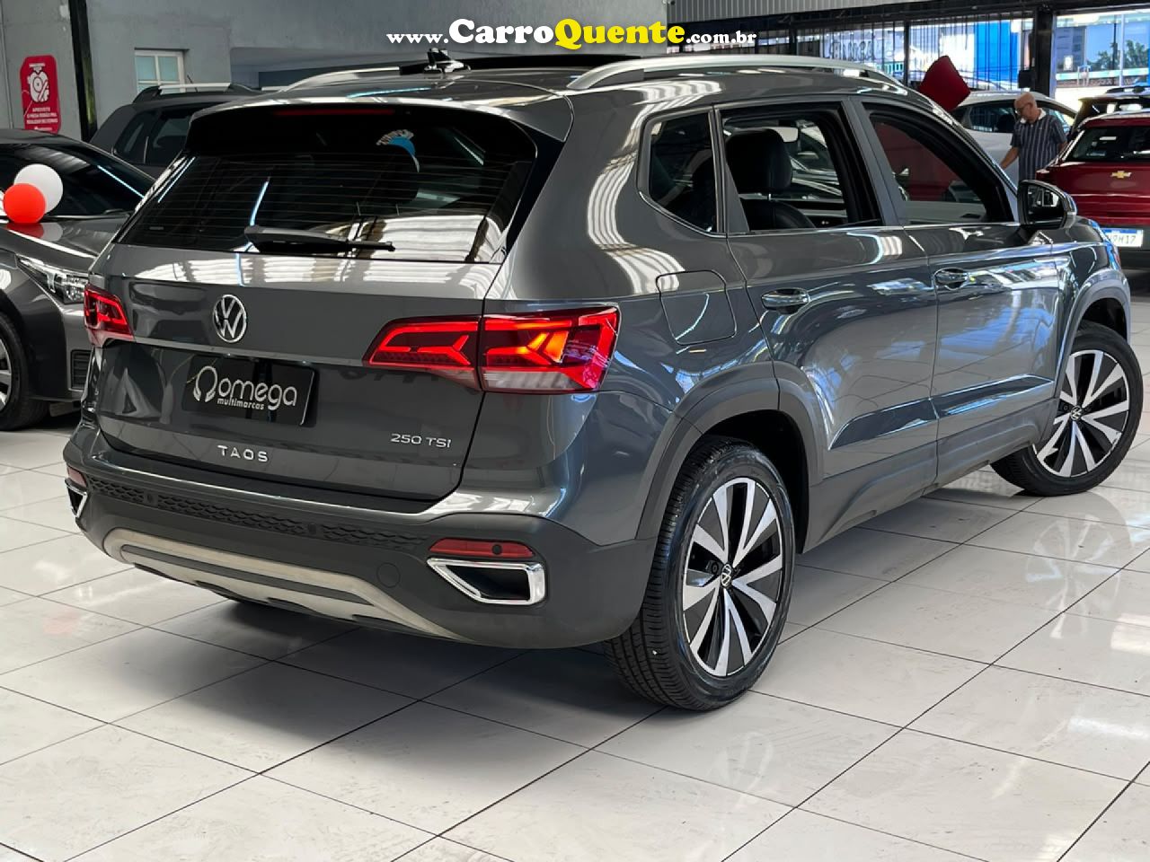 VOLKSWAGEN   TAOS HIGHLINE 1.4 250 TSI FLEX AUT.   CINZA 2022 1.4 FLEX - Loja