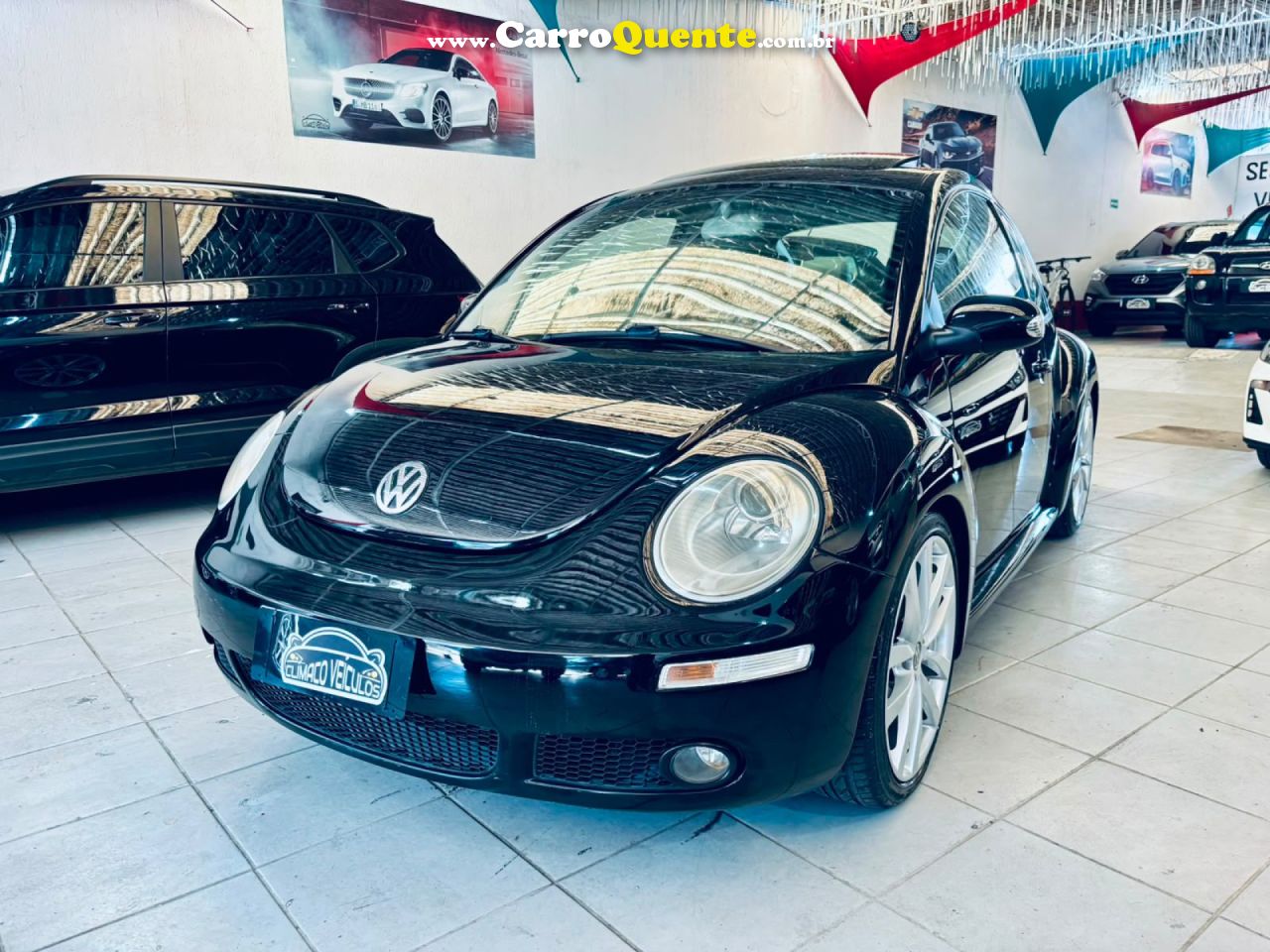 VOLKSWAGEN   NEW BEETLE 2.0 MI MEC.AUT.   PRETO 2007 2.0 GASOLINA - Loja