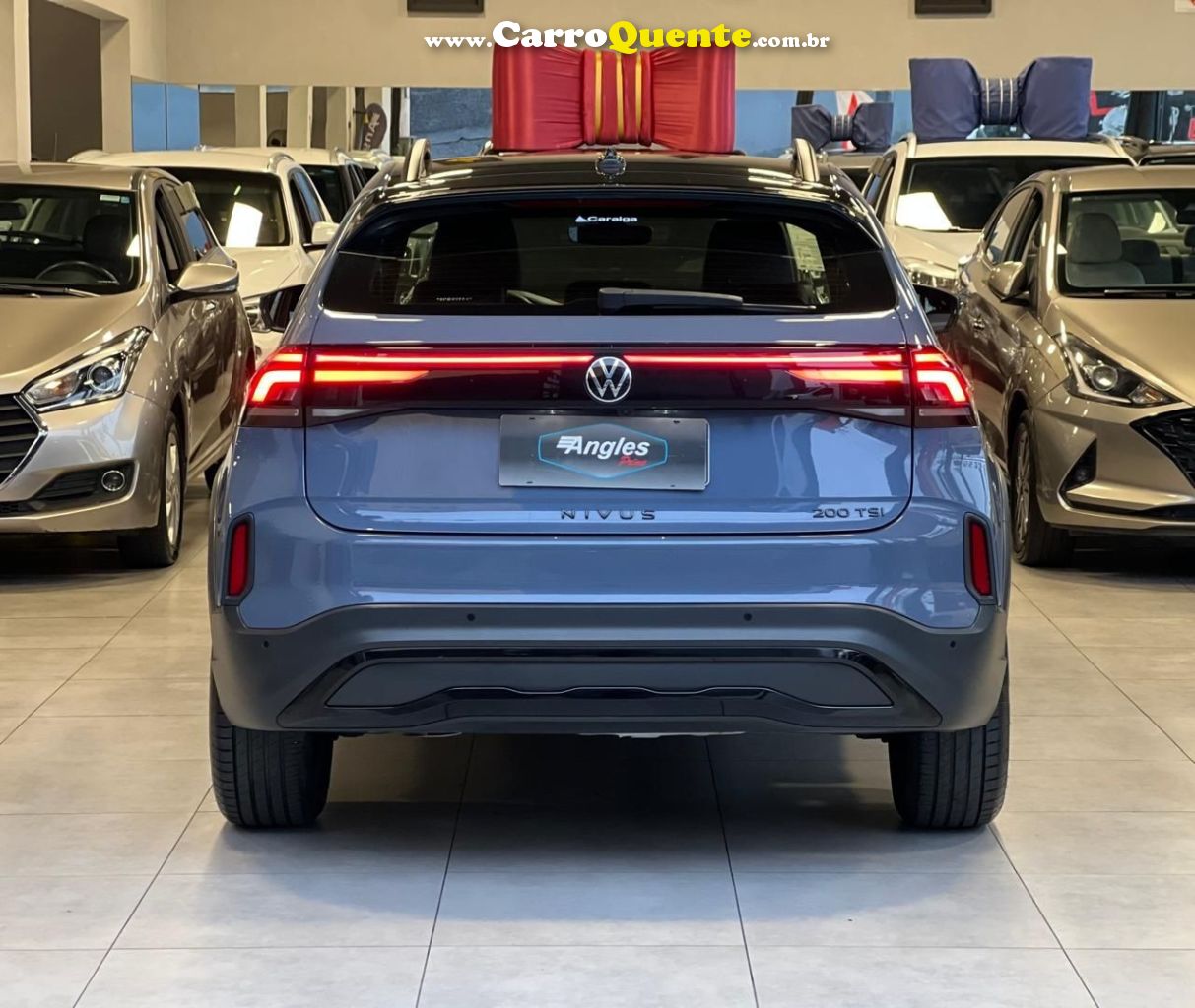 VOLKSWAGEN NIVUS 1.0 200 TSI TOTAL HIGHLINE 2025 - Loja