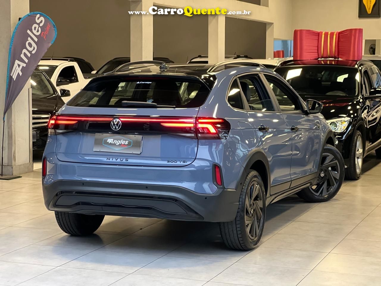 VOLKSWAGEN NIVUS 1.0 200 TSI TOTAL HIGHLINE 2025 - Loja