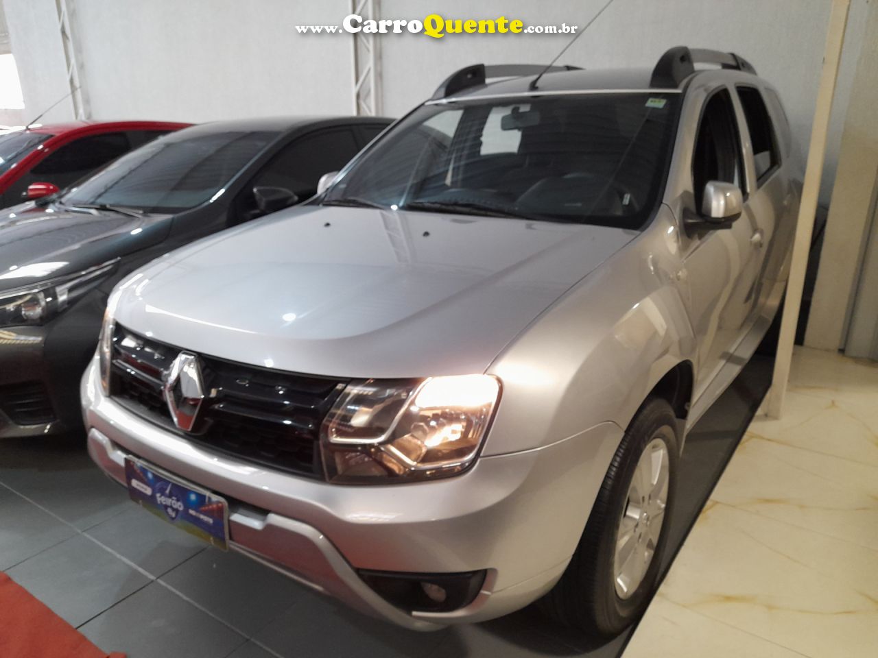 RENAULT   DUSTER 20D 4X2A   PRATA 2016 2.0 FLEX - Loja