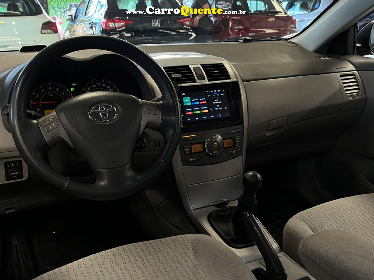 TOYOTA   COROLLA XLI 1.81.8 FLEX 16V MEC.   PRETO 2009 1.8 FLEX - Loja