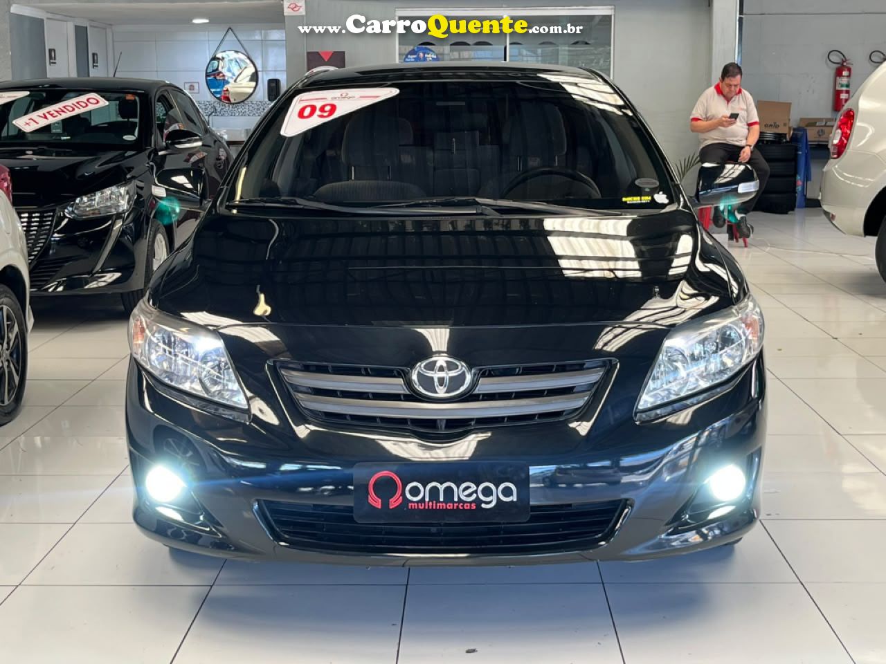 TOYOTA   COROLLA XLI 1.81.8 FLEX 16V MEC.   PRETO 2009 1.8 FLEX - Loja
