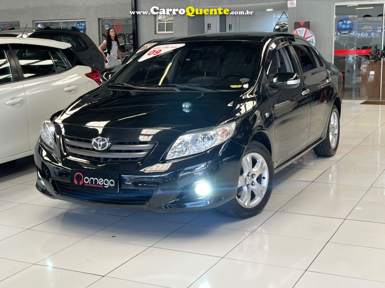 TOYOTA   COROLLA XLI 1.81.8 FLEX 16V MEC.   PRETO 2009 1.8 FLEX - Loja